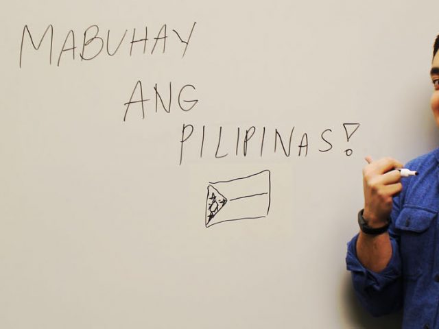 Political Science Major Andrew Bautista poses in a new Business Hall at Rowan University