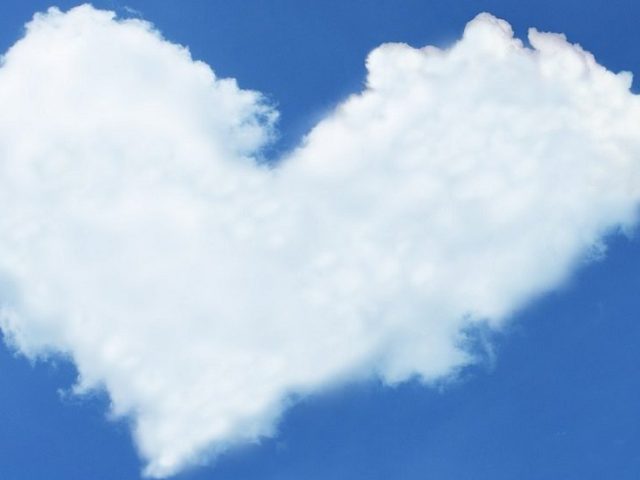 cloud in shape of a heart in a blue sky