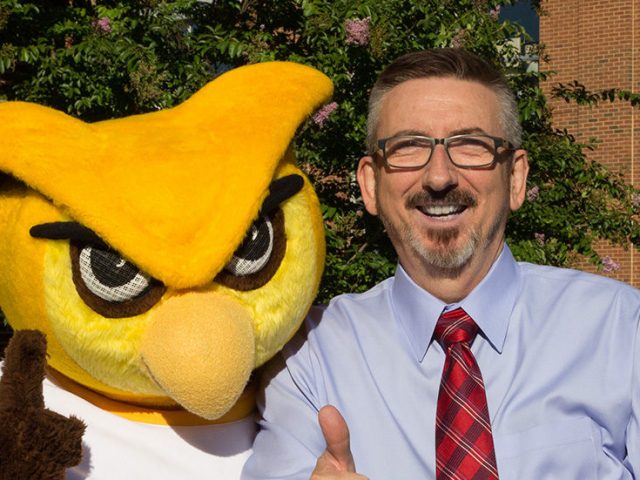 Dr. Jeff Hand and Rowan Mascot Whoo RU