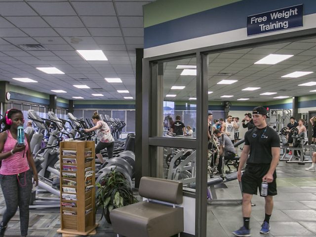 students working out in rec center