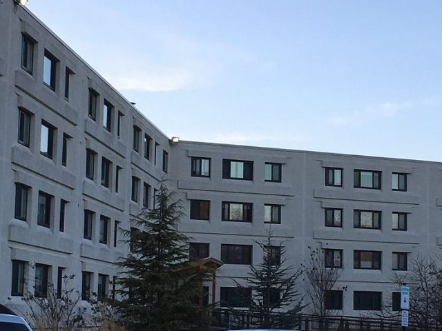 concrete exterior of Triad apartments