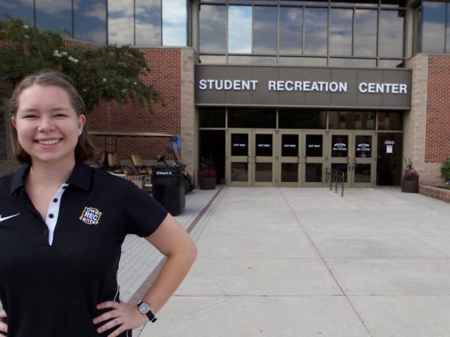 Katie standing outside of the Rec Center