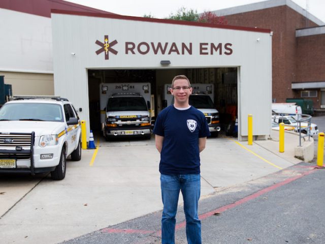 Rowan student Kevin standing outside Rowan EMS building