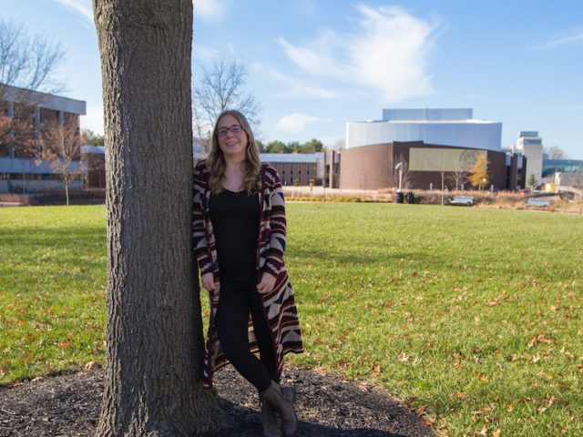 Education major Melissa outside of Robinson Circle at Rowan University campus