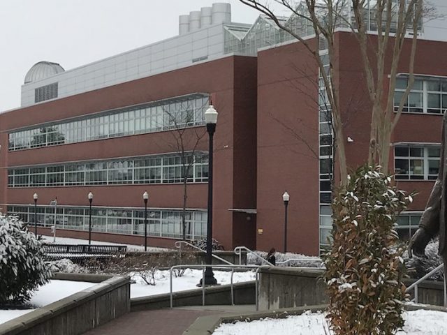 henry rowan statue outside savitz hall at Rowan University