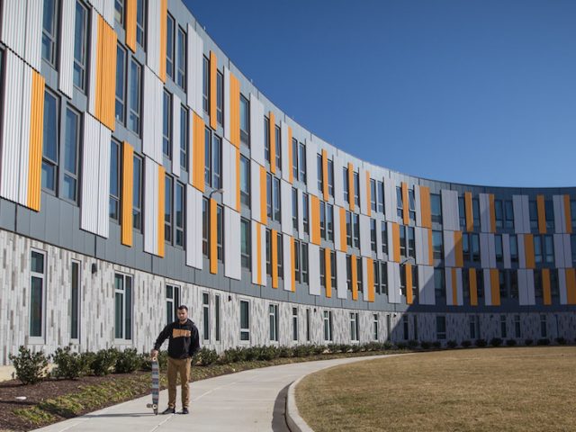 Curving outside architecture of Holly Pointe Commons