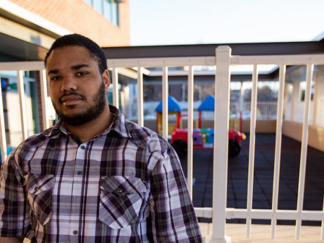 Darius outside Rowan playground at Early Childhood Demonstration Center at James Hall