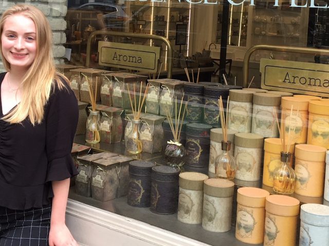 Nicole stands in front of the window front of NYC's Sabon for her Rowan University internship