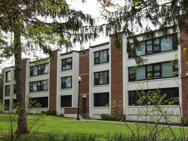 rowan university evergreen hall with greenery