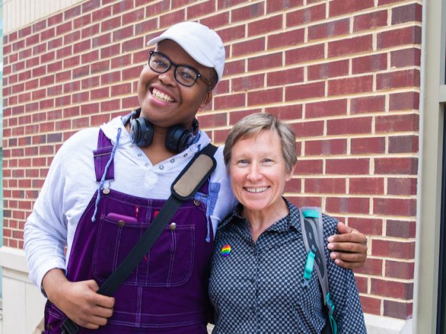 Student and teacher outside rowan Blvd