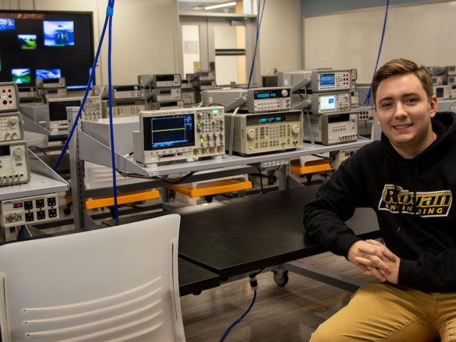 DJ sitting inside electrical lab