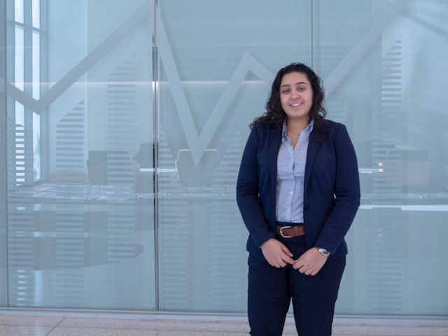 Marah inside Business building at Rowan University