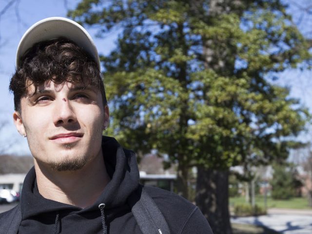 Joey Coyle of Rowan University looks upward toward the sky