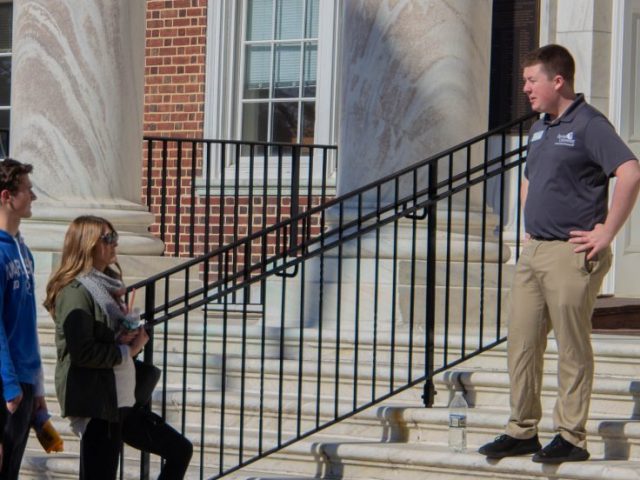 Future Rowan students touring campus with their tour guides