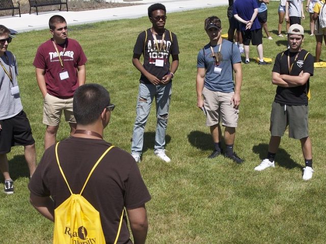 Rowan Choice students meet at an orientation outside of Wilson Hall