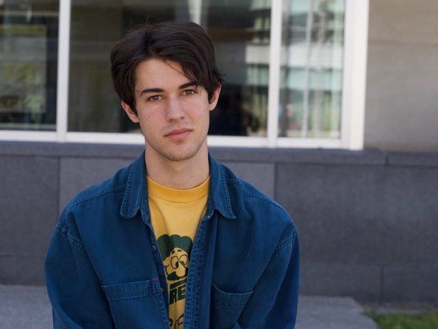 Rowan transfer student and Music Industry major Nikola Berardo photographed outside Engineering Hall