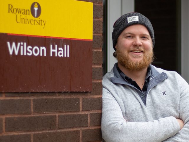 Music Industry major Jeff McConnell stands outside Wilson Hall