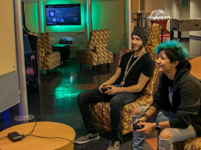 Matt and his friend play Super Smash Bros in the Game Room.