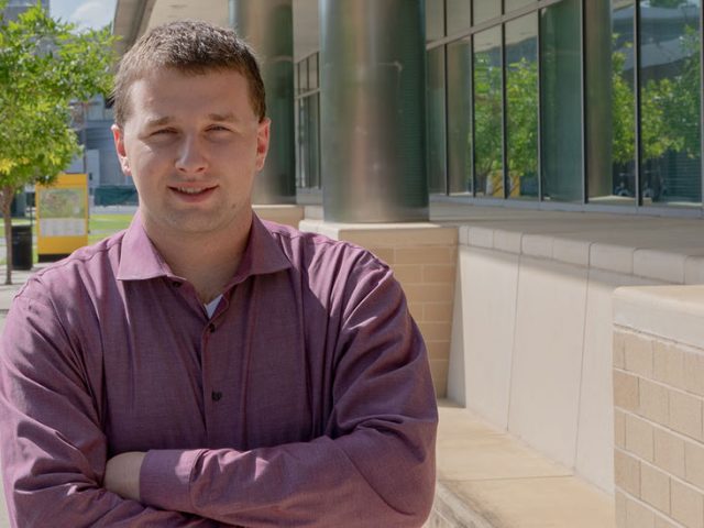 Ben Wilner stands outside James Hall