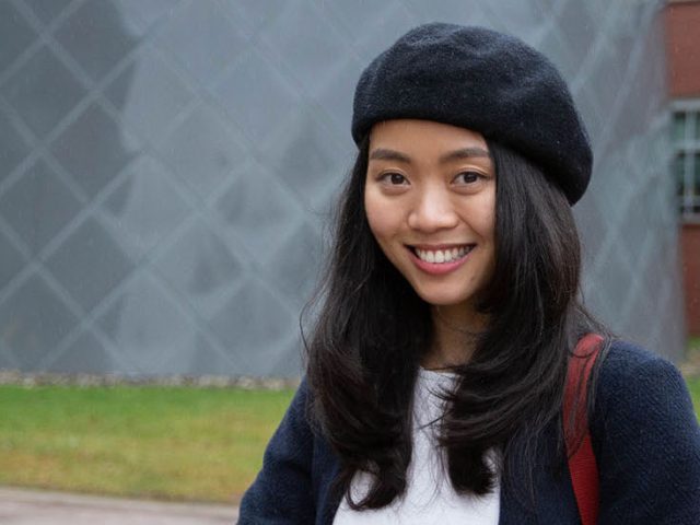 Nam Phuong Nguyen Hoang stands outside Science Hall