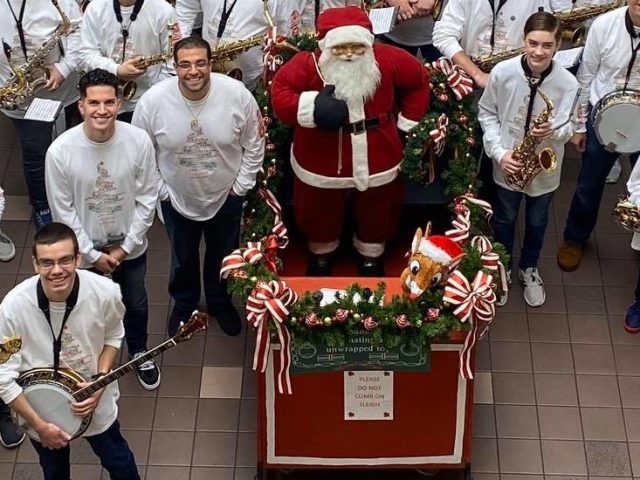 Rowan student TJ Ferry and members of his Mummers band