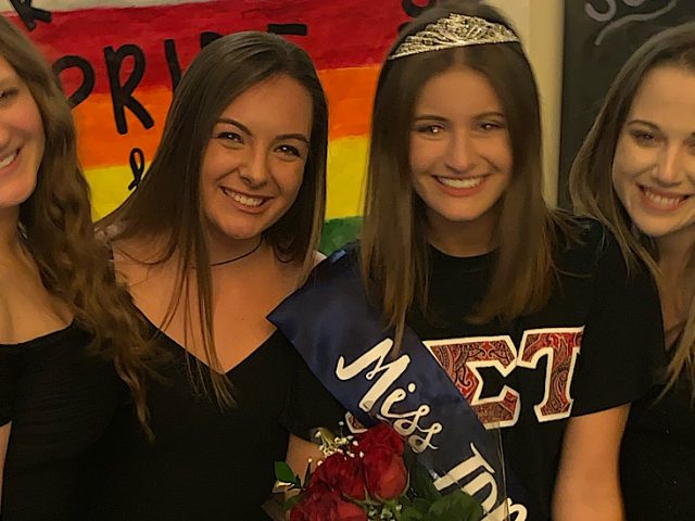 One of my favorite memories of my friends and I on stage after I won the Miss Tau Delta Phi Pageant.