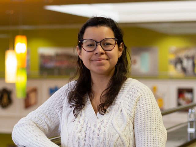 Mariana Cardenas poses inside the Chamberlain Student Center.