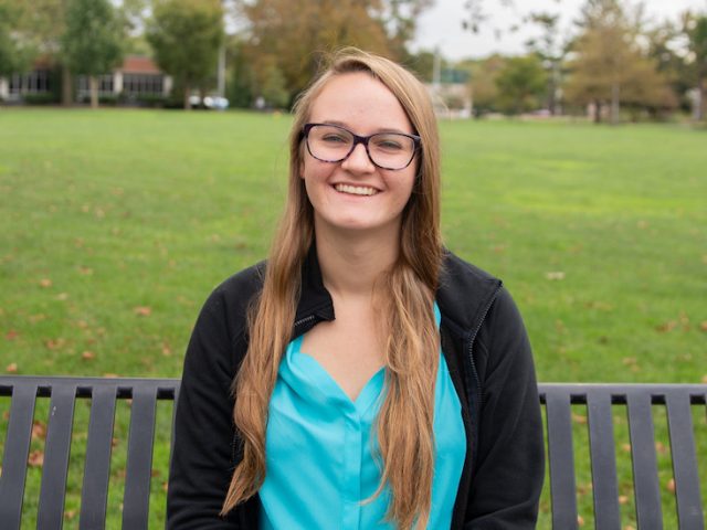 Allison Niemiec poses for a photo on the Bunce Green.