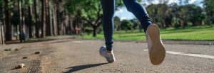 A stock image of a close up of running feet.
