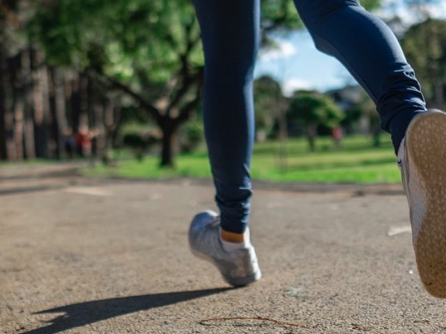 A stock image of a close up of running feet.