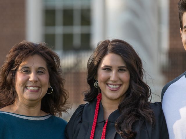 Emilyann poses with her family.