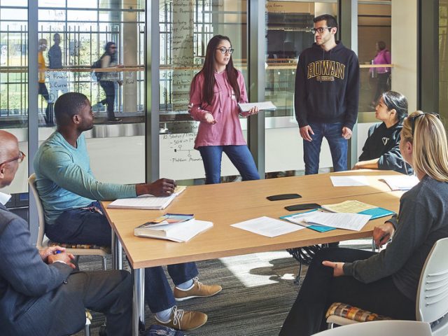 Rowan students discuss a business plan in the Rohrer College of Business.