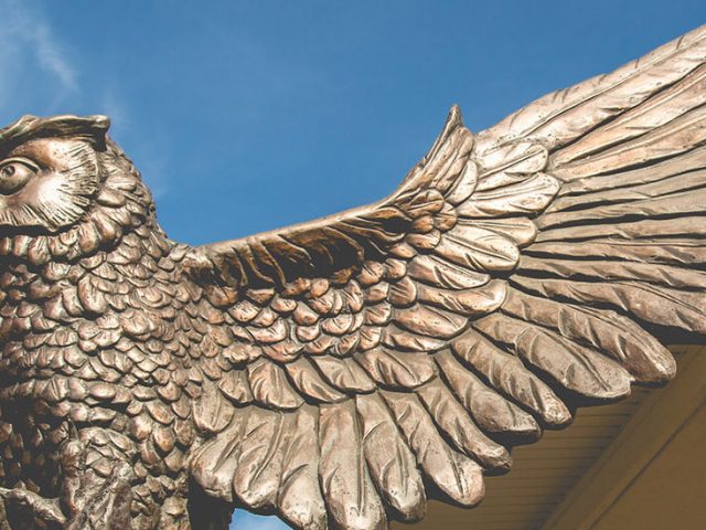 Exterior shot of owl statue on Rowan's campus