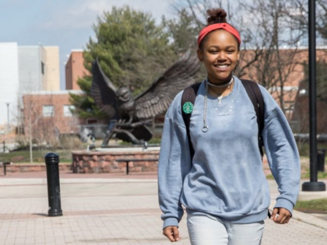 Hajah walks around campus.