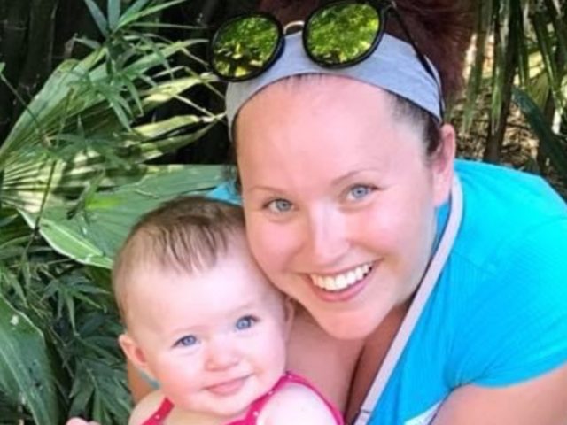 Kimberly poses with her daughter.