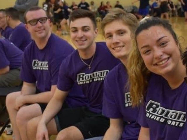 Callie poses with her Unified Sports team.