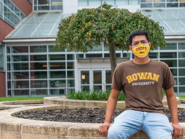 Erwin sits outside Science Hall.