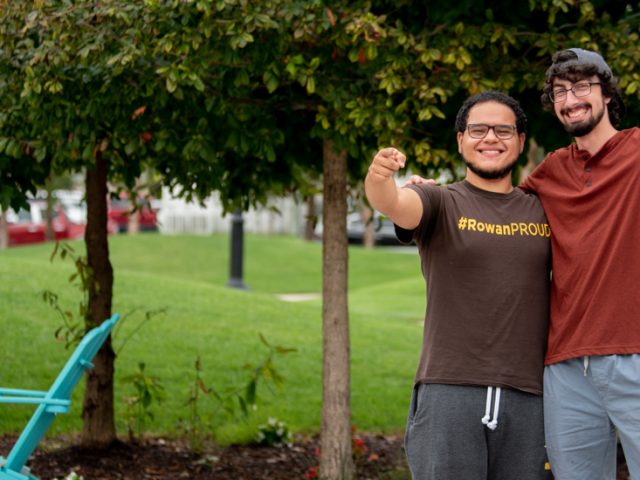 Luis and Nick posing in an inviting way.