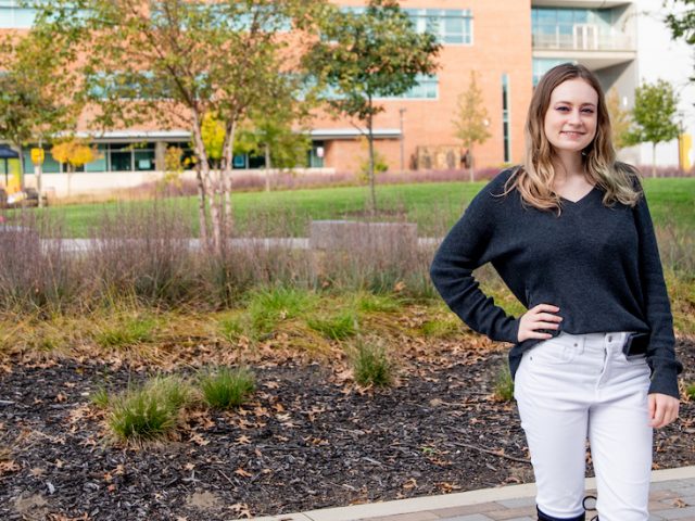 Engineering senior Alex Jackson poses outside on campus.