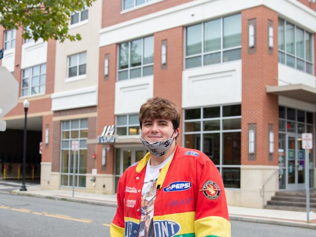 Nick stands on Rowan Boulevard