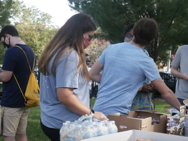 Hillel Club members in line to get jewish treats.