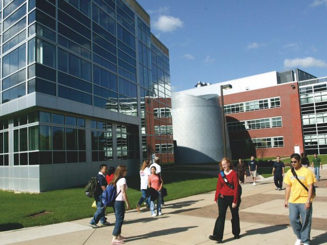 Exterior shot of students walking past Science Hall.