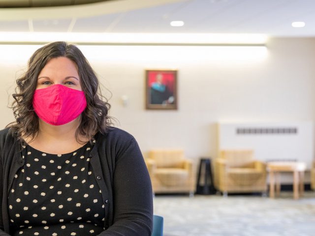 Dr. Lisa Abrams sits in Robinson Hall.