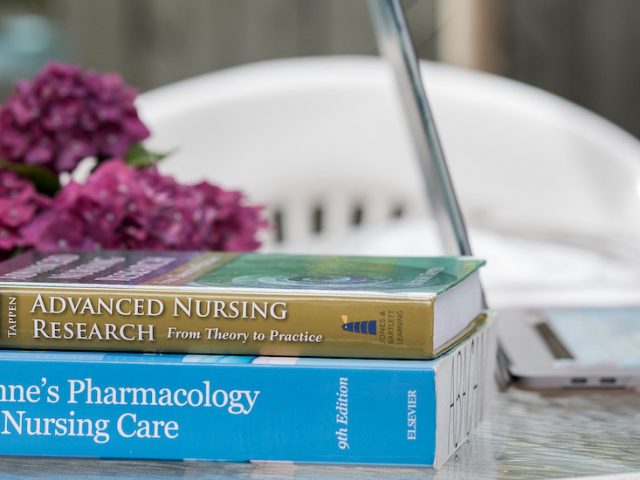 An exterior photo of nursing textbooks.