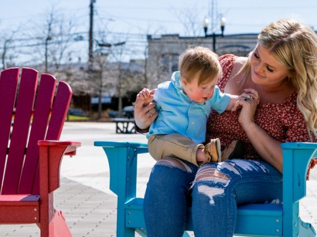 Victoria sits with her son, Rowen.