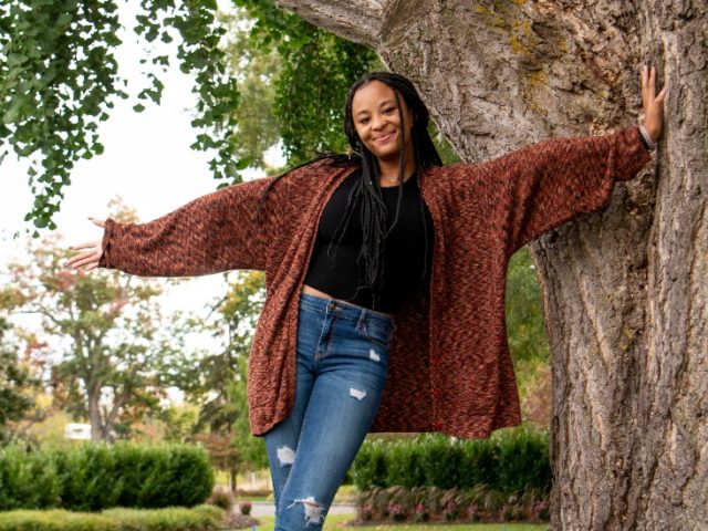 Samaria poses with a tree at Bunce Green.