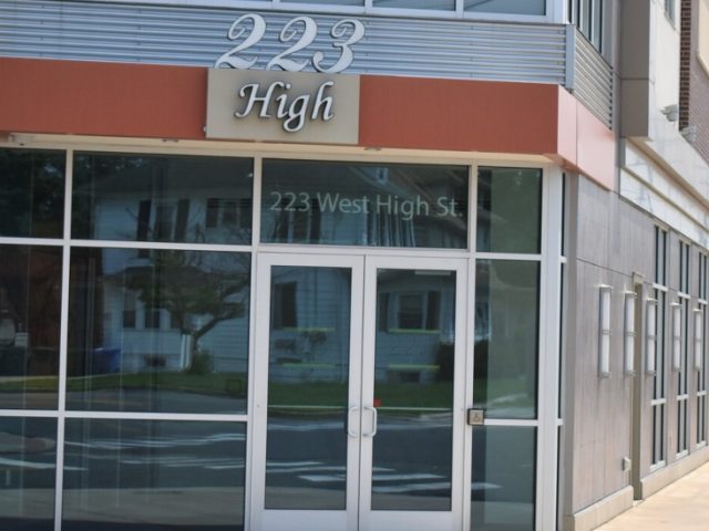 A view of the outside of the 223 West High Apartments.