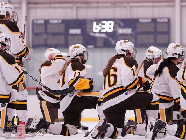 A group shot of the women's ice hockey team.