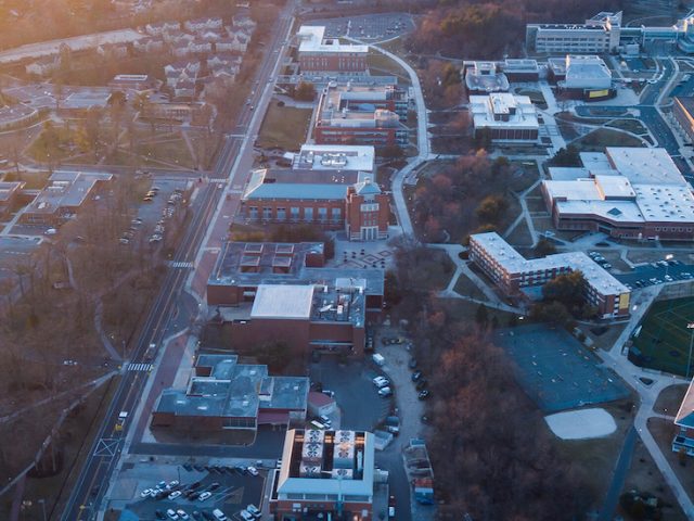 Drone shot of Glassboro campus at sunset.