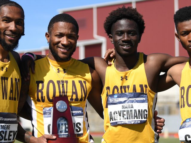 Athletes celebrate win.